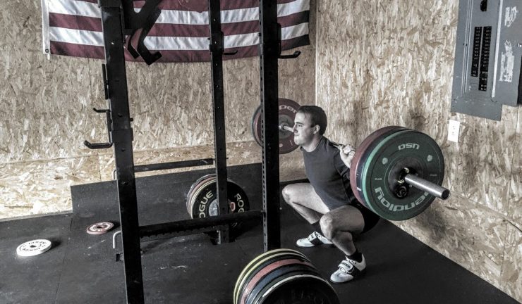 coop wearing Position Weightlifting Eastwood Shoes while squatting with a barbell