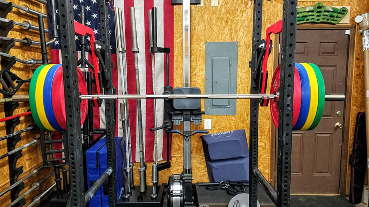 American Barbell Urethane Bumper Plates in a garage gym