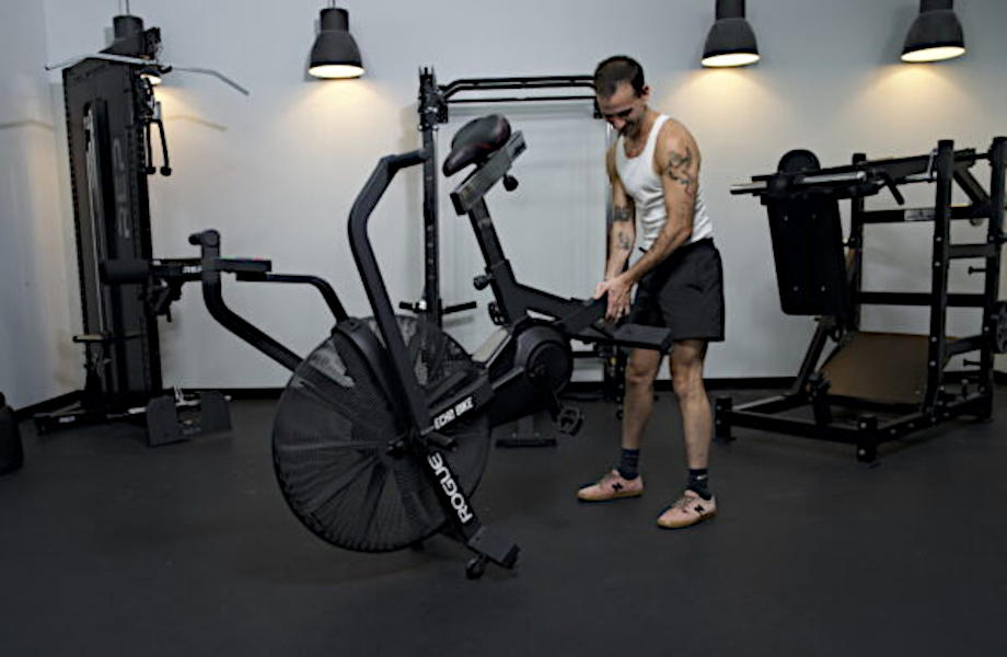 A person moving a Rogue Echo Bike