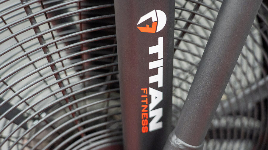The Titan Fitness branding is shown between the spokes of the Titan Fan Bike.