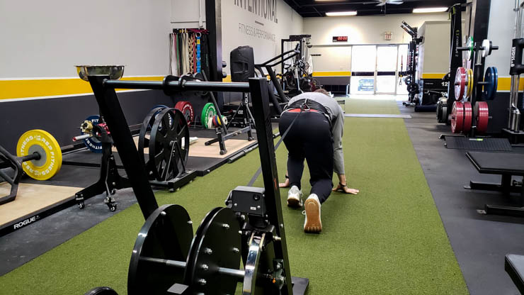 coop testing out Run Rocket Sprint Resistance Trainer