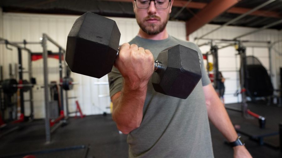 Man doing bicep curls with a dumbbell
