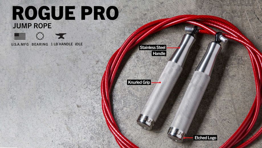 Labeled image of the red Rogue Fitness PRO Jump Rope, identifying the stainless steel handles, knurled grip, and etched logo.