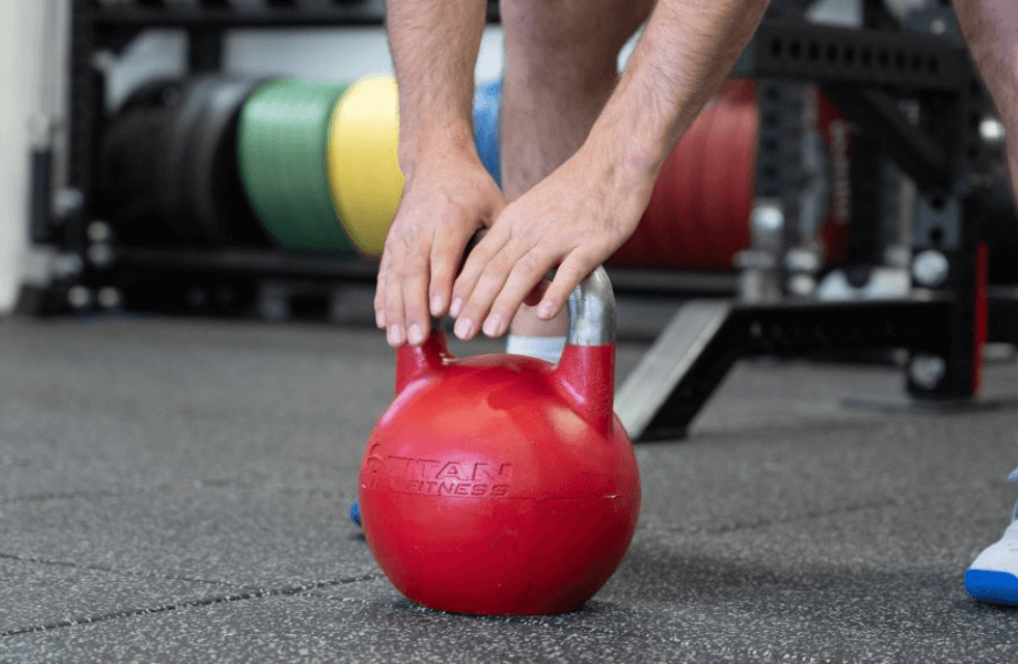 Our tester training with the Titan Fitness Adjustable Competition-Style Kettlebell 