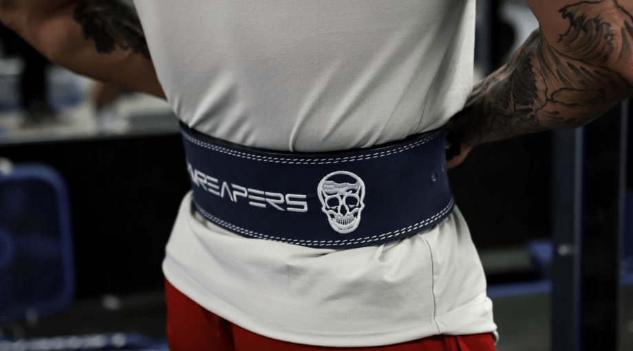 Back of person wearing Gymreapers lever belt.