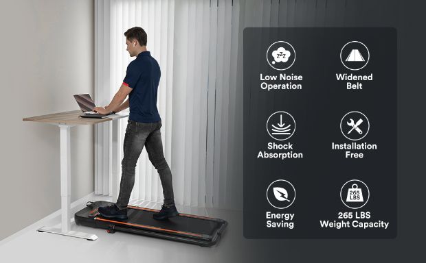 man using the urevo 2 in 1 treadmill