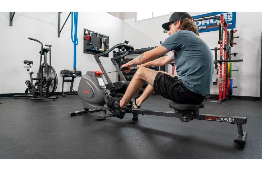 Sunny Health & Fitness SPM Magnetic Rowing Machine in use