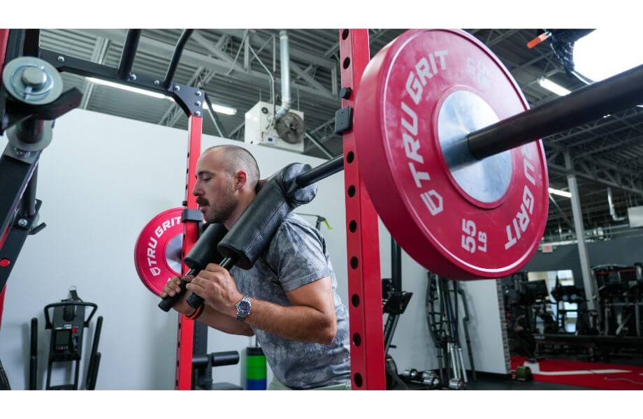 Titan Series Safety Squat Bar in use