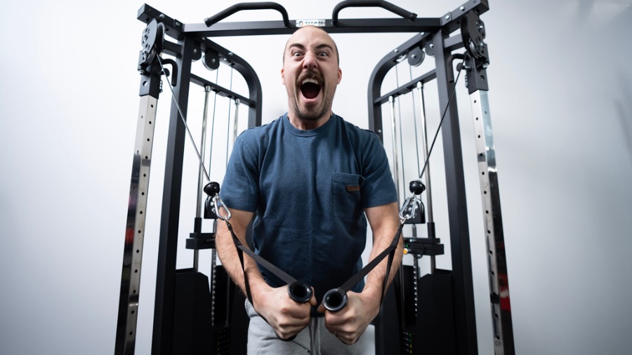 Man using the Titan Fitness Functional Trainer