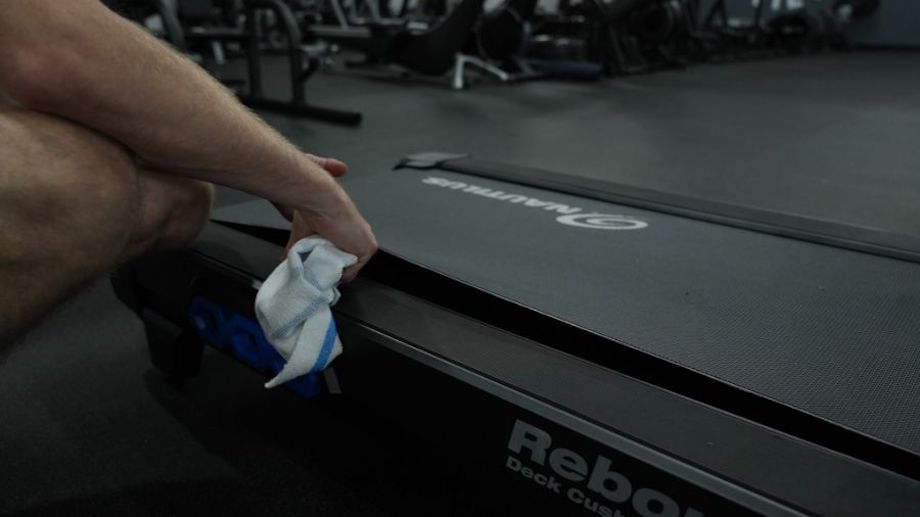 Wiping Under Treadmill Belt