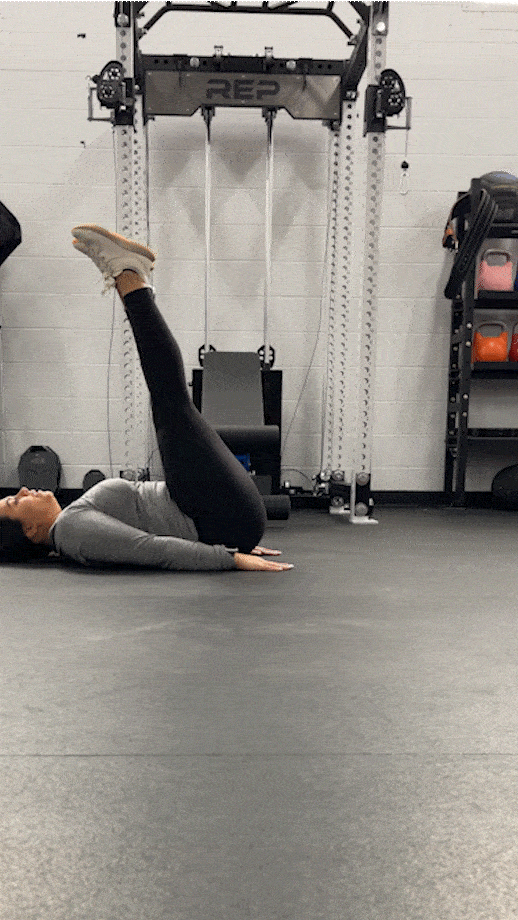 woman doing leg raises