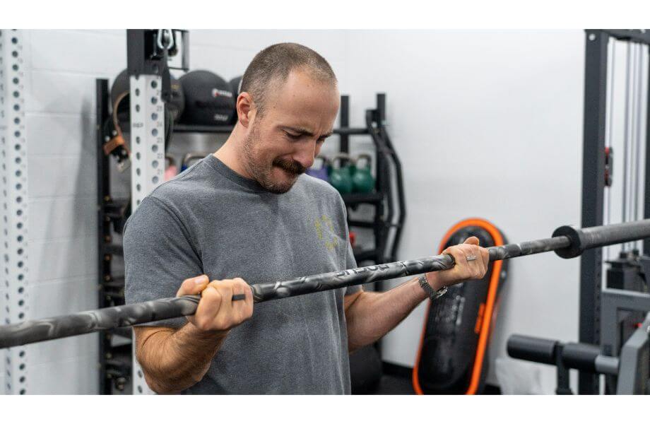 Coop curling while wearing an Oura Ring