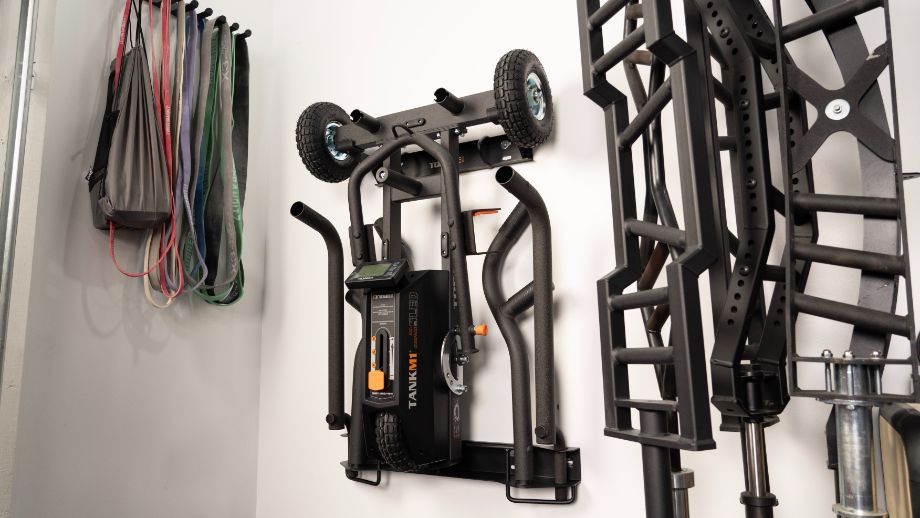 Torque Tank M1 mounted on a garage gym wall