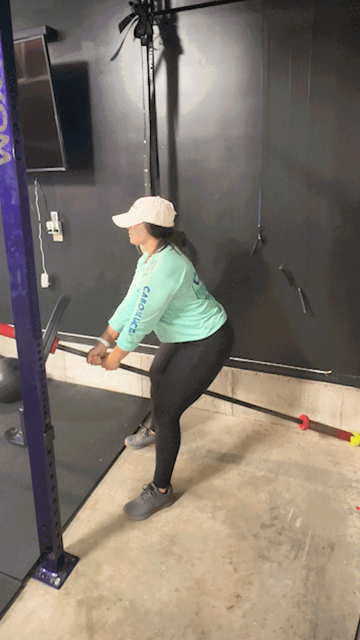 woman doing landmine row