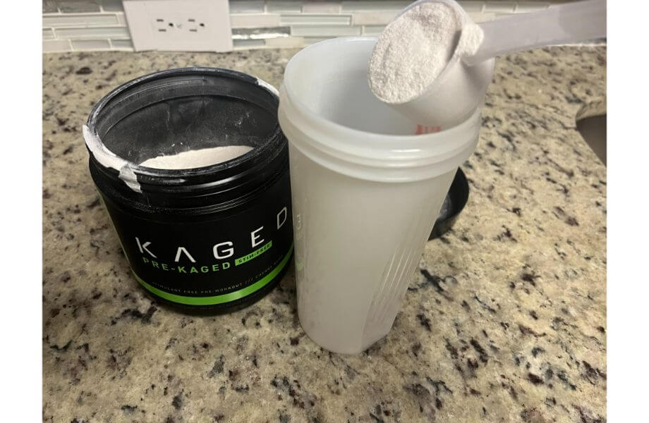 kaged stim free pre workout being tested in a shaker bottle