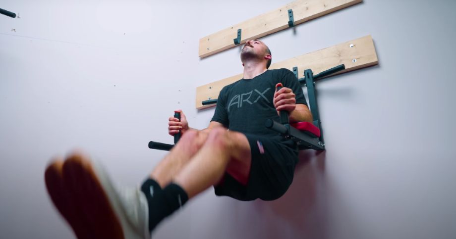 Coop doing leg raises on the OneTwoFit Power Tower