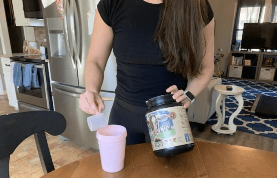 Woman testing earth fed muscle protein