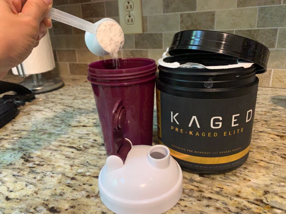 Kaged Pre-Kaged Elite being poured into a shaker cup