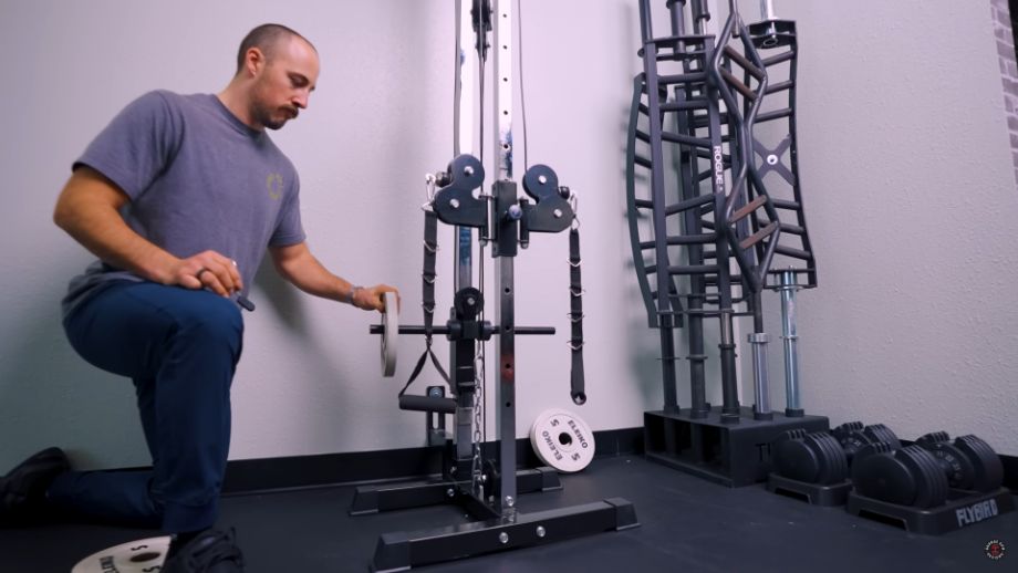 Loading weight on the Titan wall-mounted pulley tower