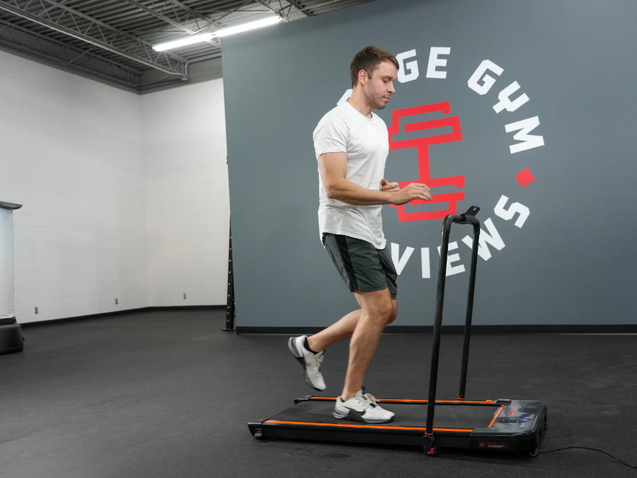 A man jogging on the UREVO 2-in-1 Treadmill