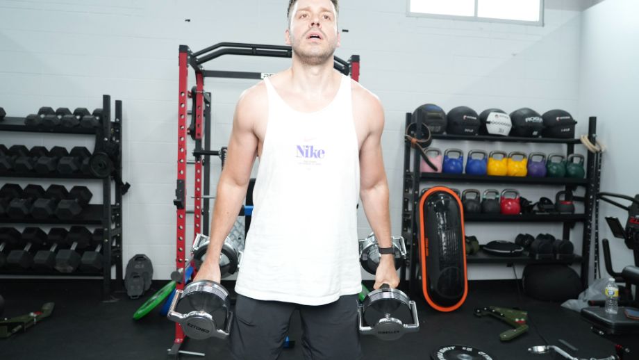 Man holding dumbbells