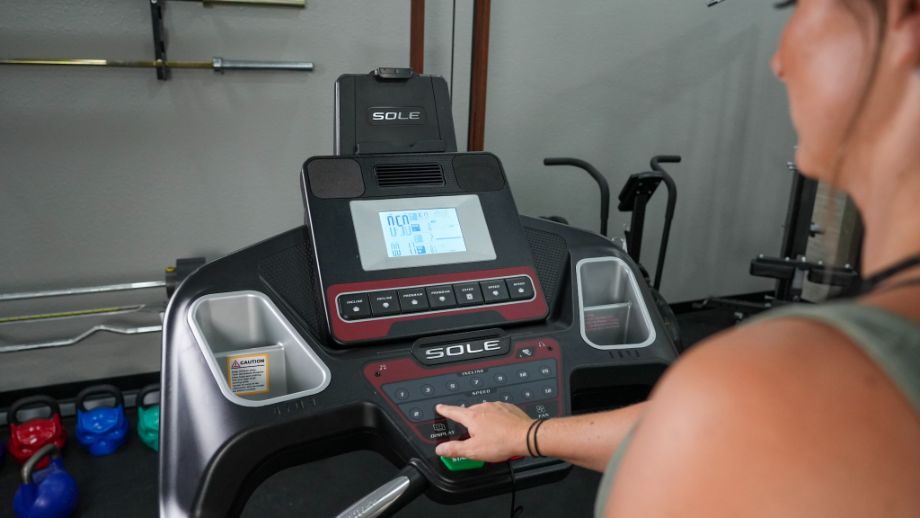 woman using the console on the sole f63