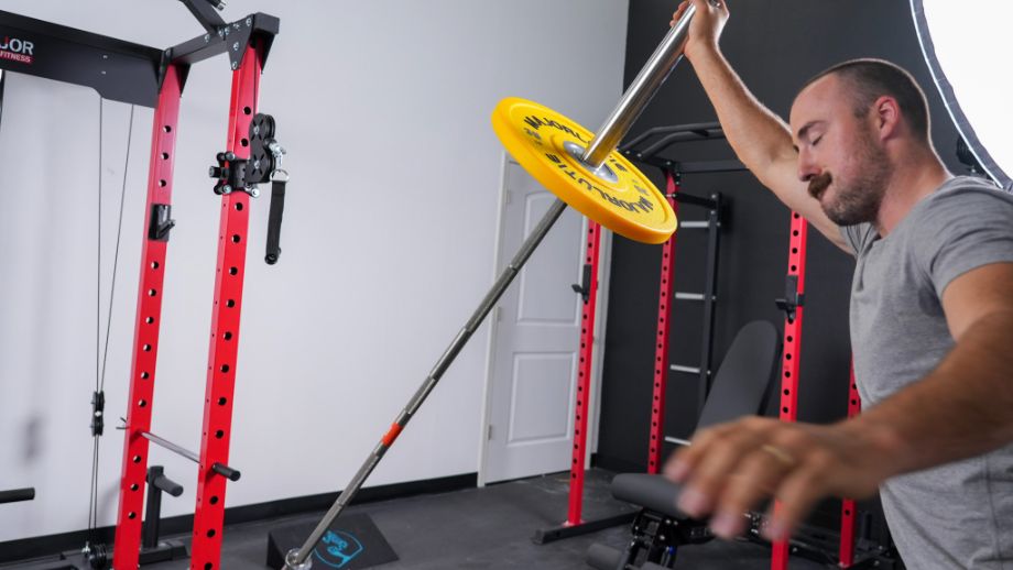 Man using the landmine attachment of the Major Fitness Power Rack