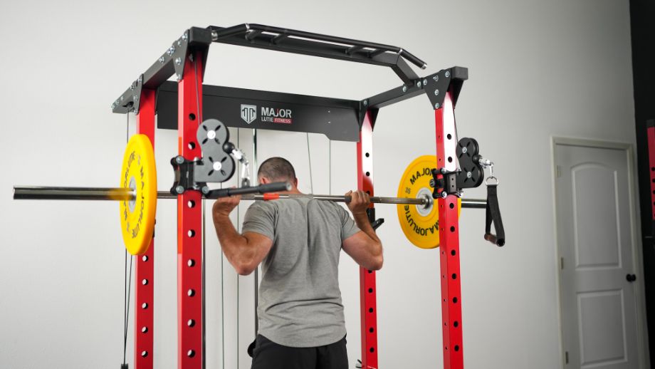 Man about to back squat for the Major Lutie Power Rack Review cover