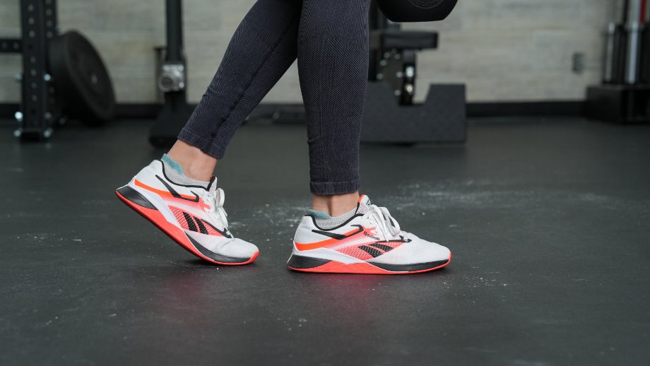 A close up of feet walking while wearing the Reebok Nano X4 cross-training shoes.