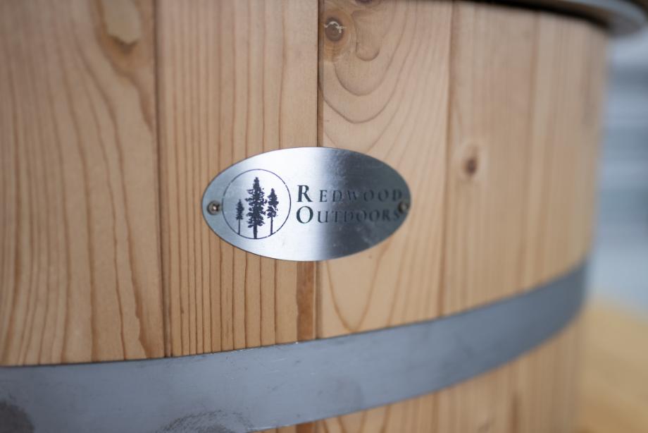 A close look at the logo on the Redwood Outdoors Alaskan Cold-Plunge Tub.