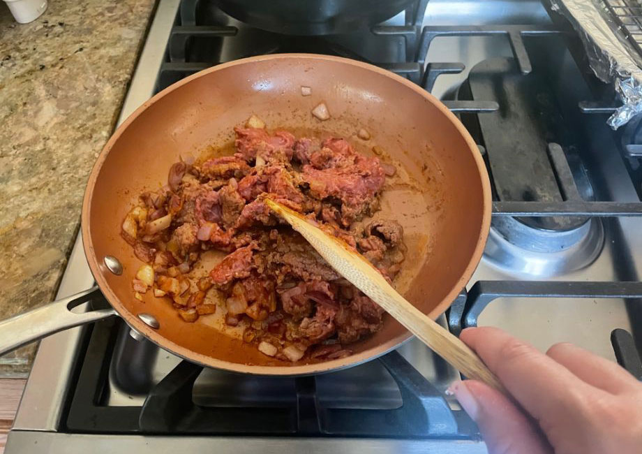 Cooking turkey taquito meat for a meal kit from the Dinnerly service.