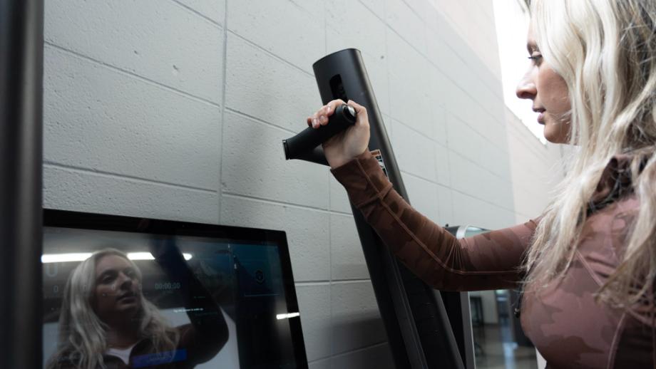 Woman testing out the CLMBR