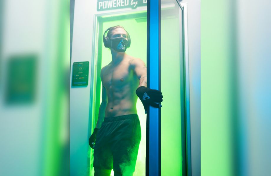 man stepping out of a cryo-chamber