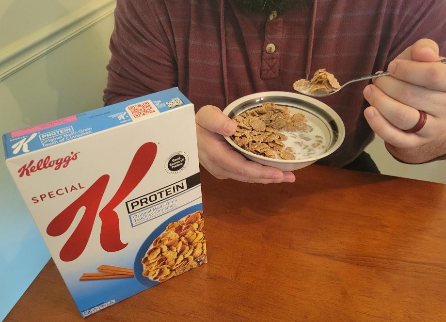 A person eats Special K cereal.