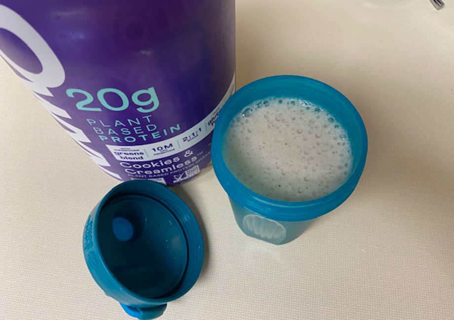 Looking at a freshly-mixed shake made from OWYN Plant Protein Powder.