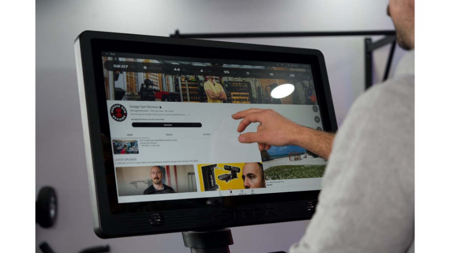 Choosing a YouTube video on the STEPR display screen.