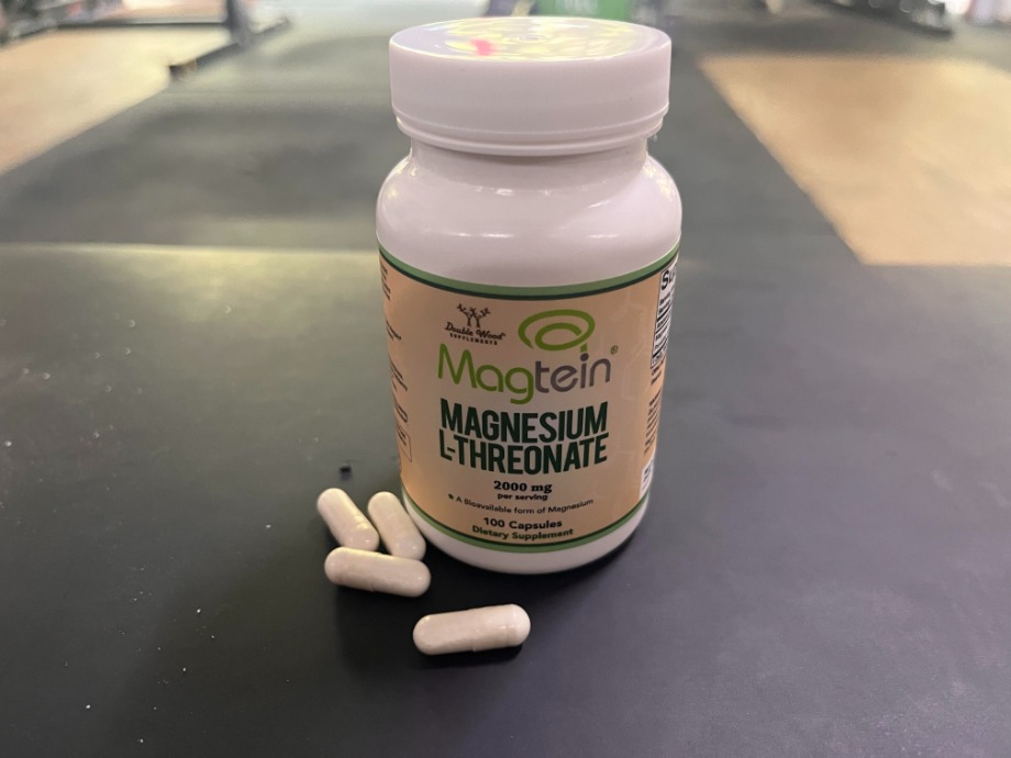 A bottle of DoubleWood Magnesium capsules.