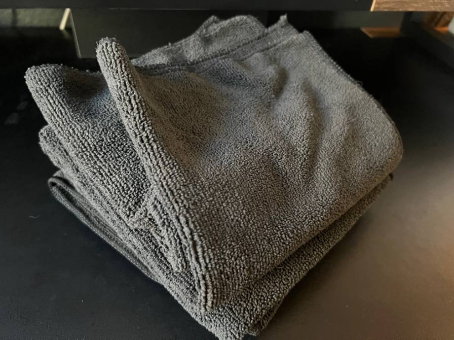 A stack of folded gray towels