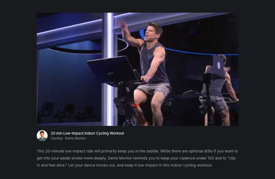 A male instructor leading a class on the Peloton Bike