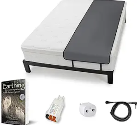 Earthing Elite Sleep Mat on a mattress with accessories shown below