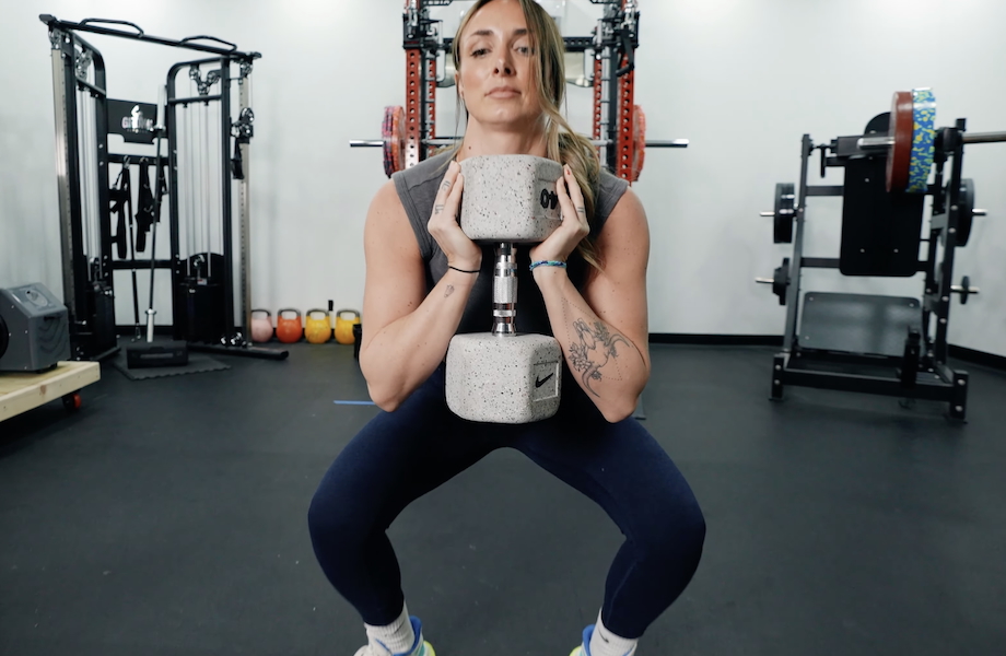 Lindsay Scheele, CPT does goblet squats with a Nike Grind Dumbbell