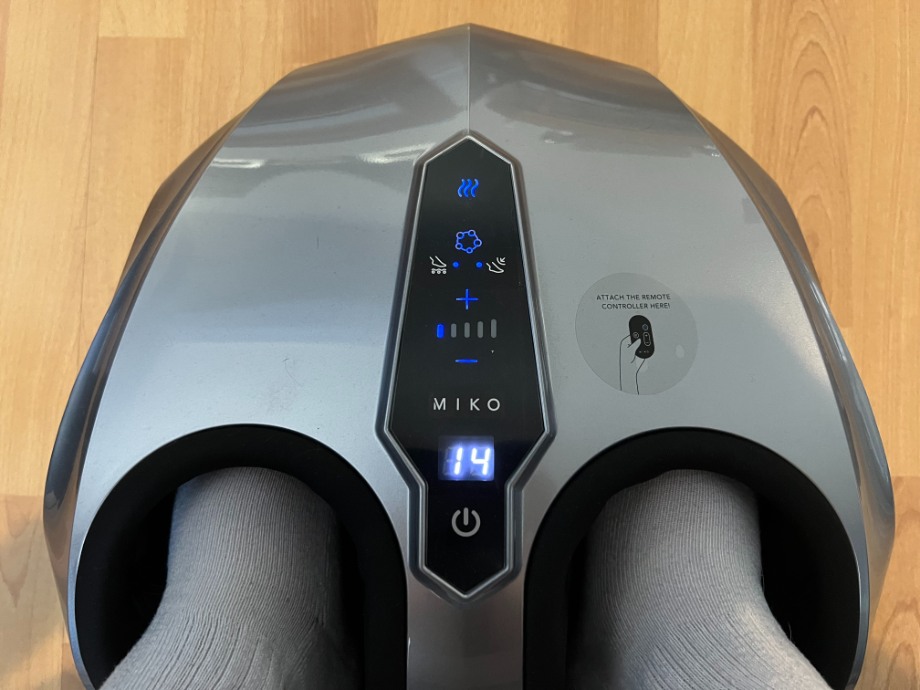 Looking down at feet inside a MIKO Foot Massager