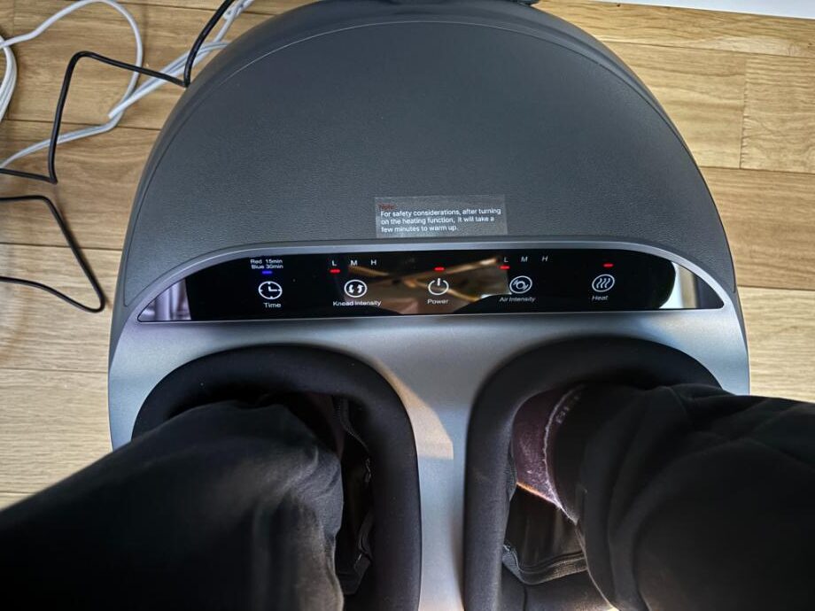 Looking down at your feet in a Renpho Foot Massager Machine