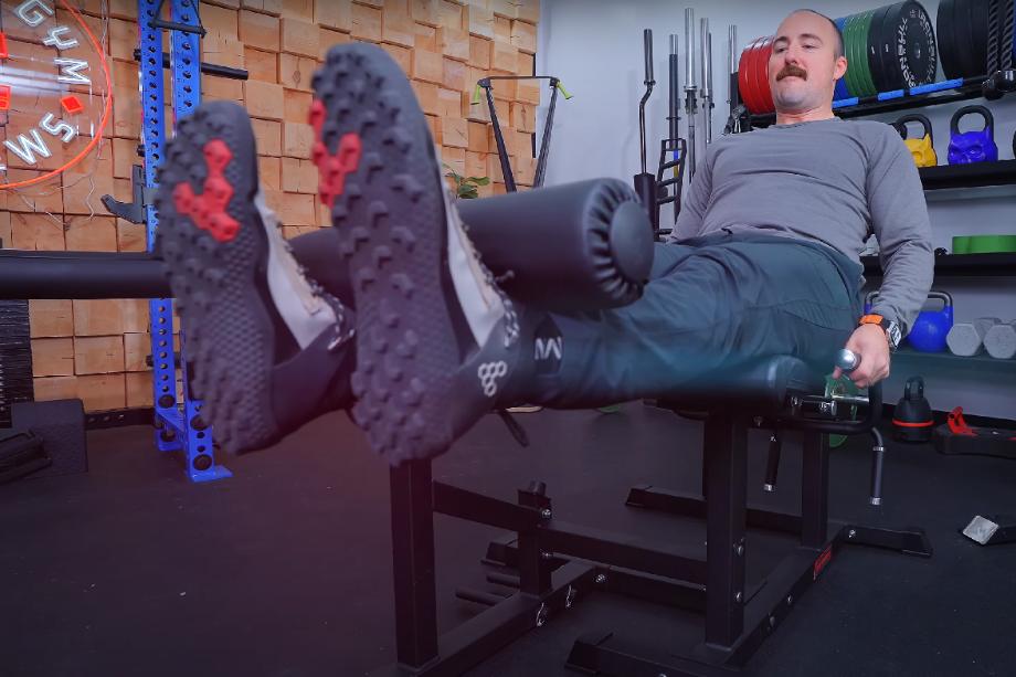 Coop does a leg extension with the RitFit PLC01 Leg Extension Curl Machine