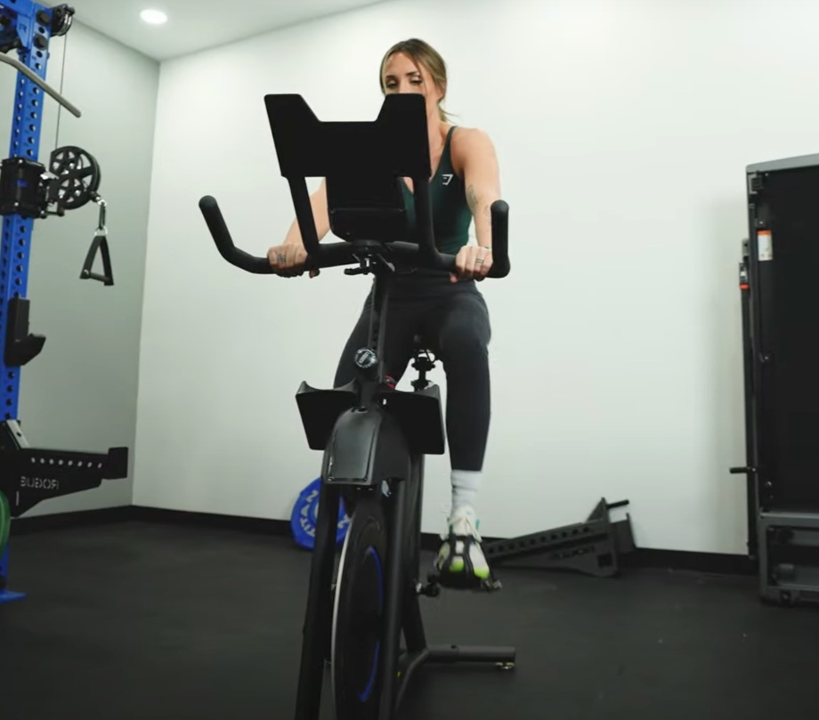 Lindsay Scheele, CPT is shown using the Horizon 7.0 IC Indoor Cycle