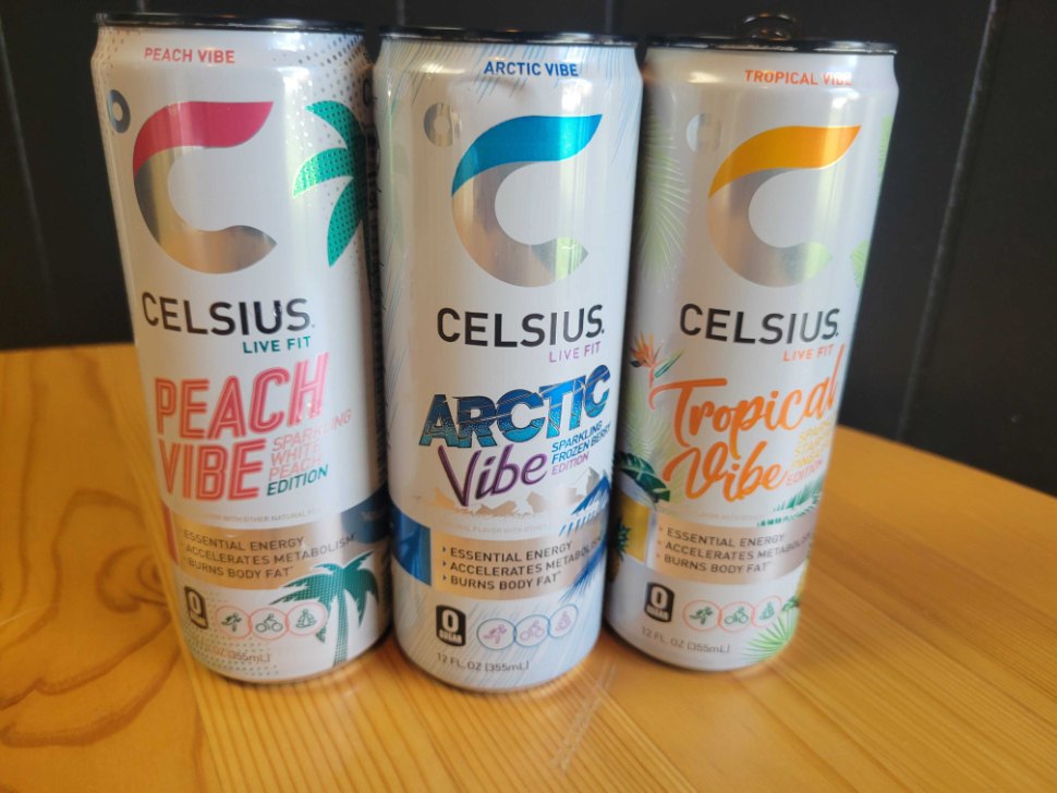 Cans of Celsius are staged to showcase different flavors.
