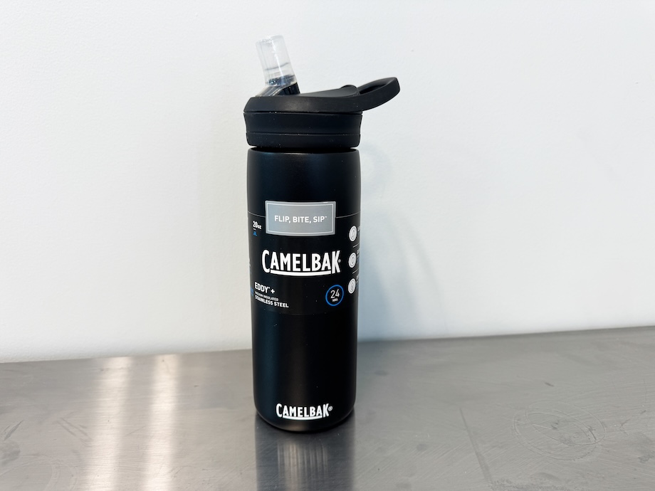 Camelbak Eddy water bottle on a stainless steel countertop