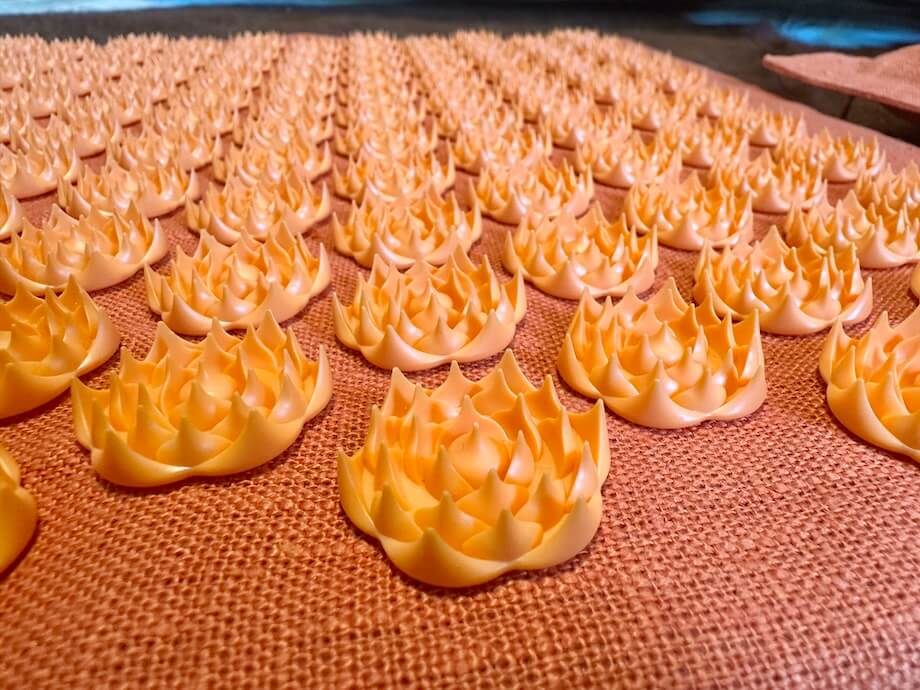 A close look at the lotus spike layout on a Pranamat Accupressure Mat.