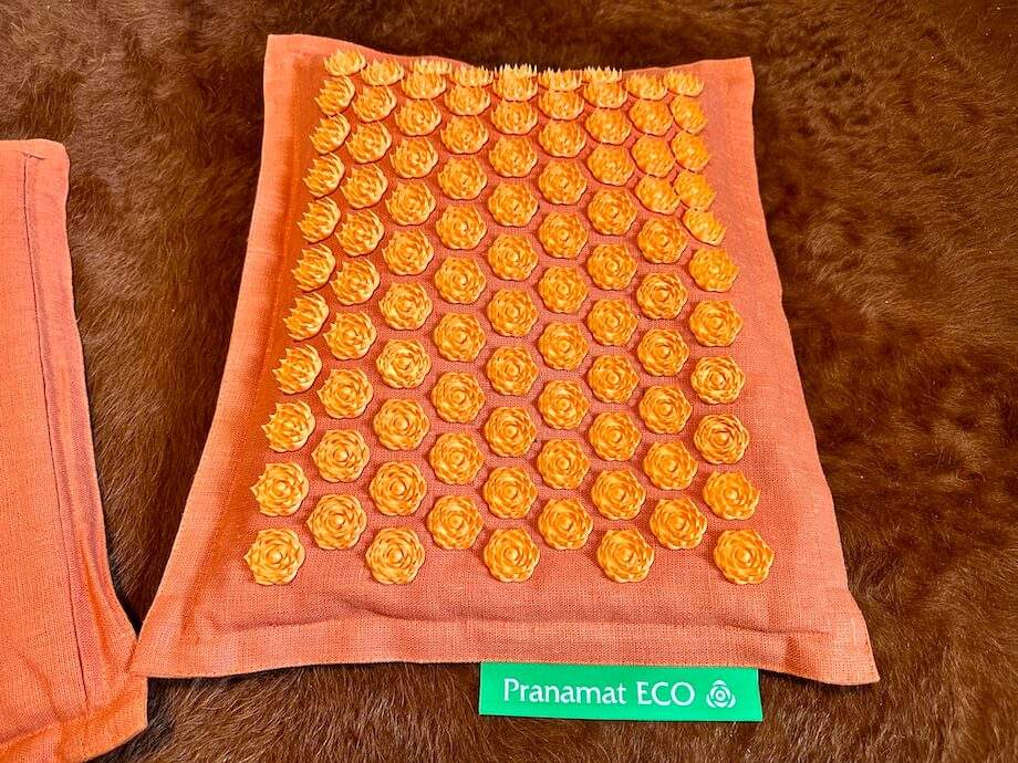 Full view of a Pranamat accupressure mat.
