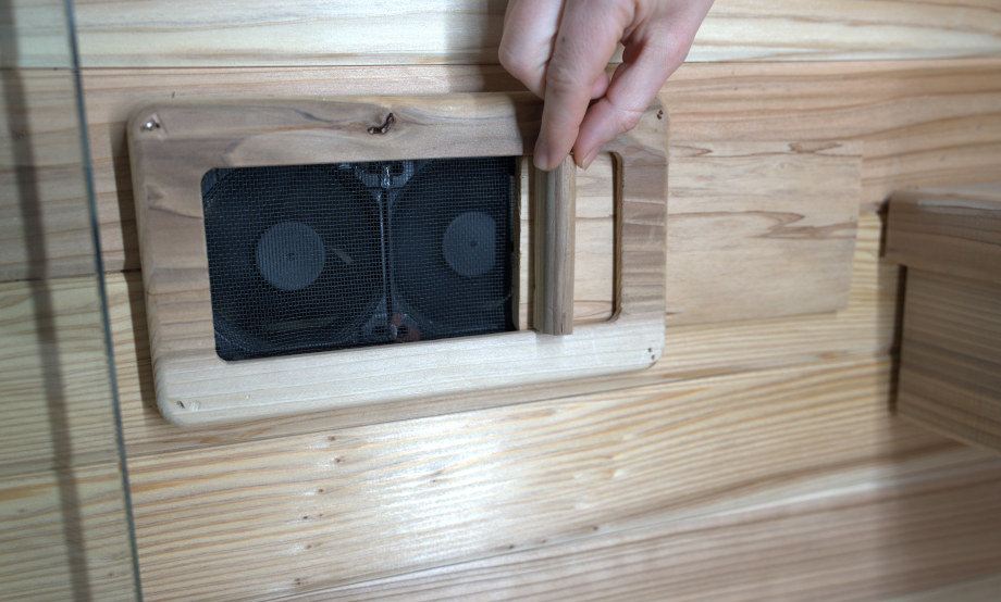 Our tester adjusts the ventilation in a Plunge Sauna Mini